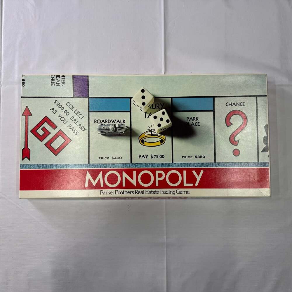 Parker Brothers Monopoly board game from the late 70s or 80s Complete, *cracked